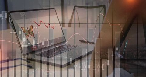 Modern finance analytics with digital chart overlay on laptop screen