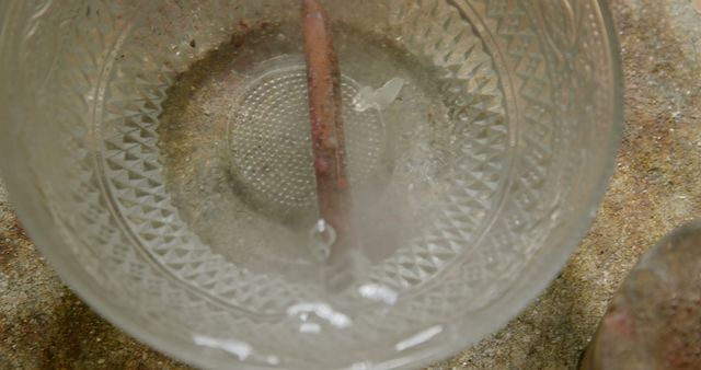 Glass Bowl with Water and Brush on Rustic Surface - Download Free Stock Images Pikwizard.com