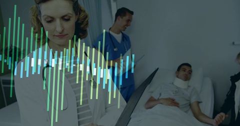 Healthcare Team Providing Patient Care in Hospital Room