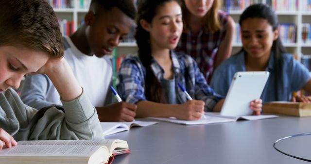 Diverse Group of Teenagers Studying Together in Library - Download Free Stock Images Pikwizard.com