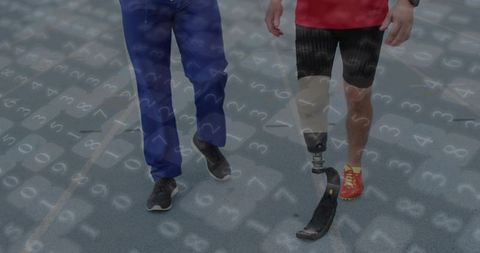 Paralympic Athlete Walking on Track with Running Blade and Coach Guiding Rehabilitation Progress