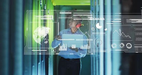 IT technician monitoring holographic analytics and diagnostics in datacenter aisle