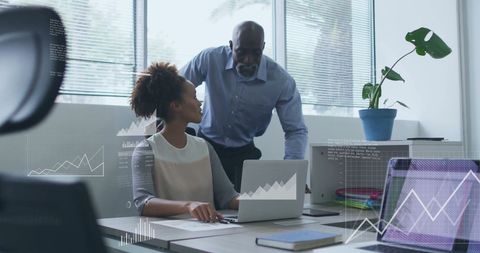 Diverse Business Team Analyzing Financial Data with Technology Overlays - Download Free Stock Images Pikwizard.com
