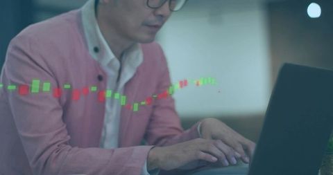Financial analyst typing on laptop with floating candlestick chart and market data overlay