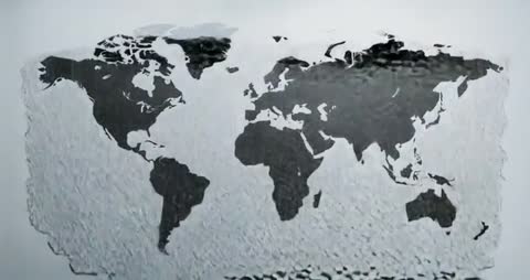Flowing Liquid Animates World Map Unveiling on Metal Surface