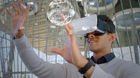 Man Engaging with Virtual World through VR Headset and Interactive Display