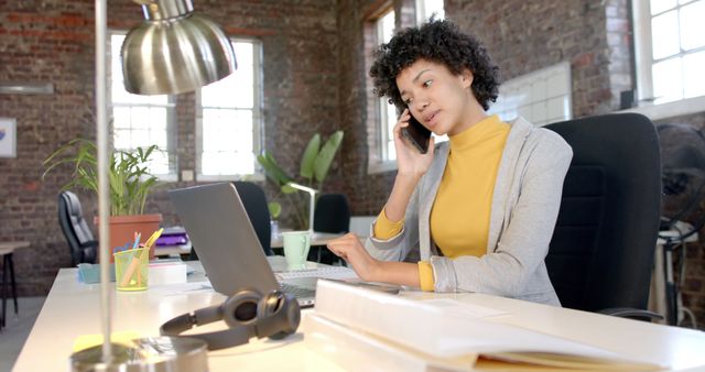 Young Professional Working in Creative Loft Office with Exposed Brick Walls - Download Free Stock Images Pikwizard.com