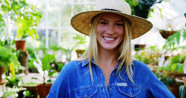 Smiling Woman In Straw Hat Working In Greenhouse Garden - Download Free Stock Images Pikwizard.com