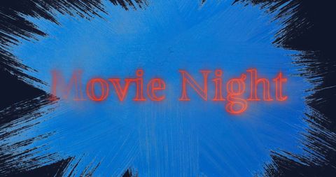 Neon movie night sign glowing against blue and black background
