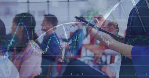 Businesswoman holding tablet and stylus analyzing financial charts during seminar with data overlay