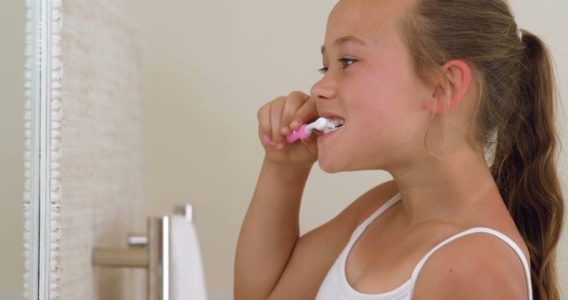 Little girl brushing her teeth 
