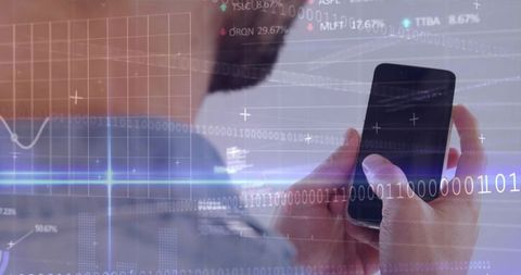 Business professional holding smartphone with holographic data overlay and binary analytics