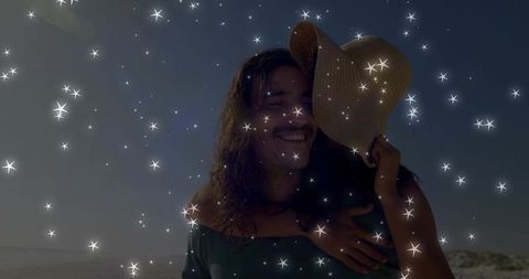 Carefree Couple at Dune Beach Under Starry Overlay