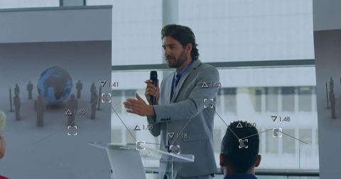 Confident Businessman Presenting at Corporate Seminar