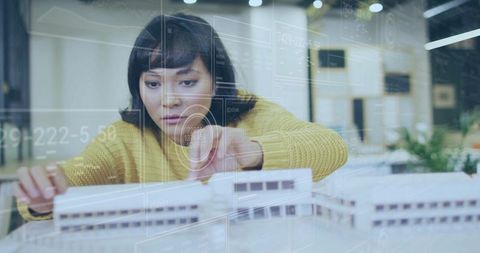 Architect Planning Design with Futuristic Digital Interface