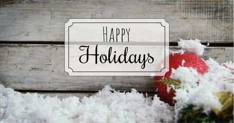 Festive Red Bauble with Happy Holidays Greeting on Snowy Background - Download Free Stock Images Pikwizard.com