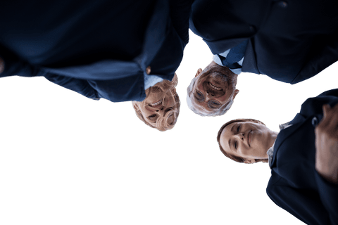 Low angle view of professionals in a transparent discussing pose