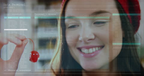Woman with Cherry Among Digital Data Interface Graphics