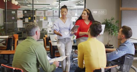 Diverse business team engaging in social media strategy discussion