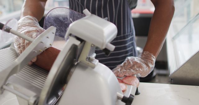 Worker Slicing Cold Cuts with Deli Meat Slicer in Kitchen - Download Free Stock Images Pikwizard.com