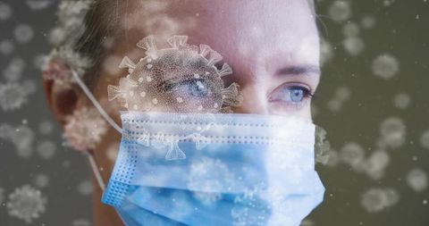 Middle-aged woman wearing surgical mask gazing right with virus overlay, clinical closeup