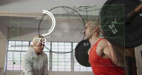 Strength coach spotting lifter performing heavy barbell back squat with fitness hud overlay