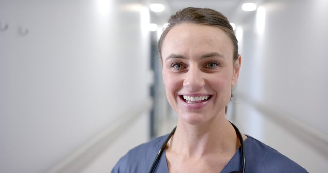 Smiling Doctor in Hospital Corridor - Download Free Stock Images Pikwizard.com