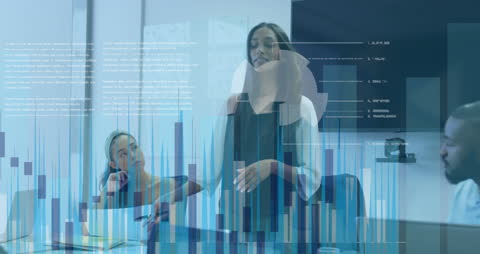 Corporate Team Analyzing Digital Data in Modern Office