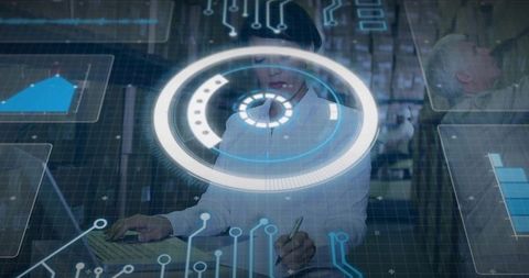 Businesswoman typing at workstation with holographic circular HUD and data visualization