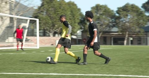 Soccer Game with Players Demonstrating Skills and Teamwork
