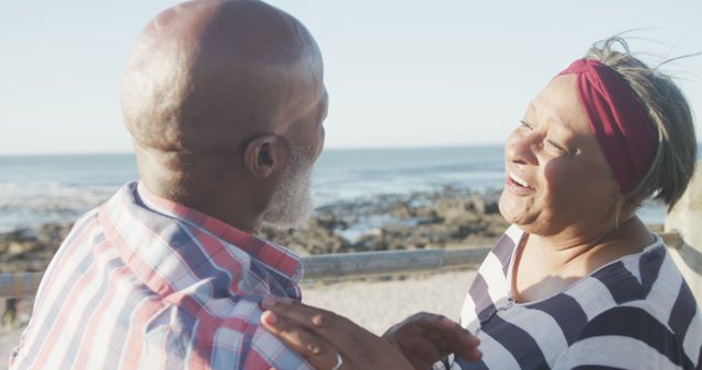 Senior Couple Embracing at the Beach During Sunny Day - Download Free Stock Images Pikwizard.com