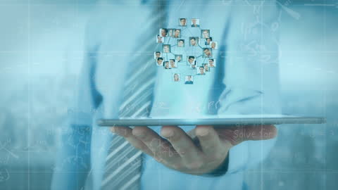 Businessman Holding Tablet with Virtual Network of Connections