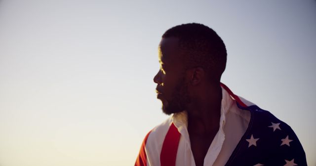 Young Man Wrapped in American Flag at Sunset - Download Free Stock Images Pikwizard.com