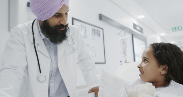 Doctor Comforting Young Patient in Hospital Corridor - Download Free Stock Images Pikwizard.com