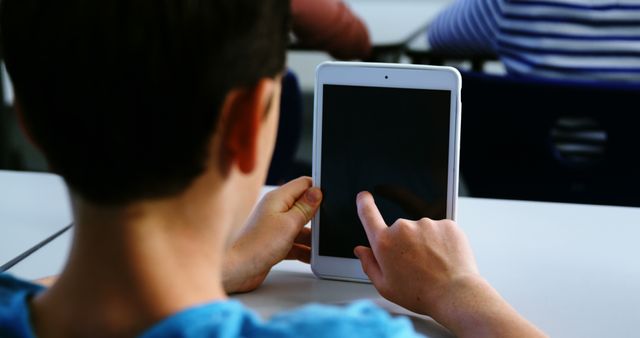 Student Using Tablet Device in Classroom - Download Free Stock Images Pikwizard.com