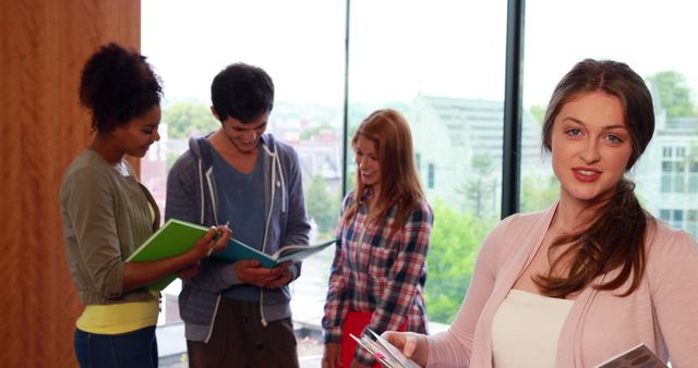 Diverse Group of Students Studying Together Near Window - Download Free Stock Images Pikwizard.com