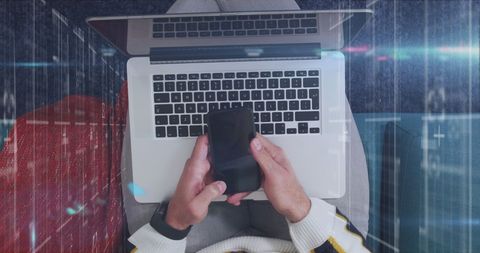 Data processing concept with smartphone and laptop use