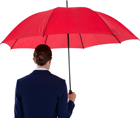 Businesswoman safeguarding goals under transparent red umbrella