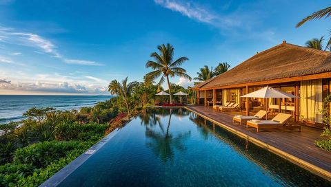 Sunset Infinity Pool Reflecting Tropical Palm Trees Overlooking Oceanfront Luxury Villa