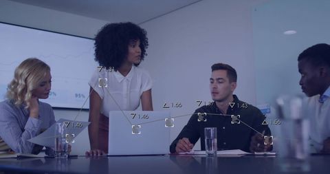 Diverse Team Analyzing Financial Data in Modern Conference Room