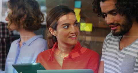 Colleagues Collaborating with Digital Technology Overlay