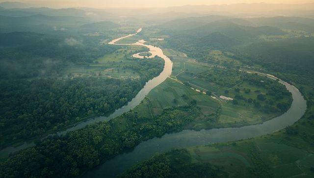 Aerial view of serene valley with meandering river
