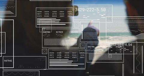 Translucent augmented data overlays floating over cabin window obscuring blurred colleagues