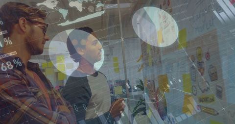 Innovative coworkers brainstorming with overlaid data visualizations