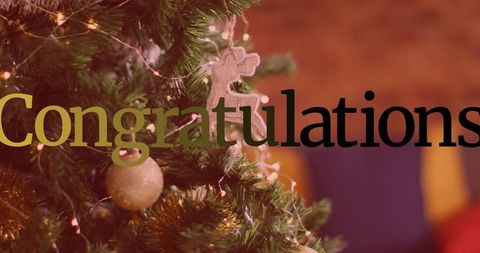 Festive christmas tree with baubles and gingerbread ornament