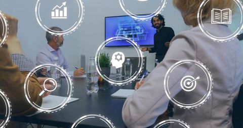 Diverse Business Team Engaging in Data-Driven Meeting with Digital Overlay