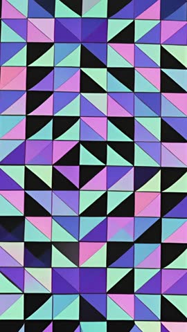 Vertical geometric video rotating triangular tiles forming colorful tessellated mosaic