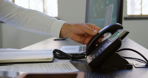 Businessman Ending Call in Modern Office Workspace - Download Free Stock Images Pikwizard.com