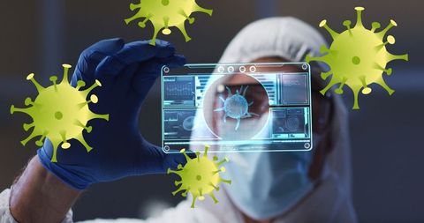 Scientist analyzing virus with digital interface and safety gear