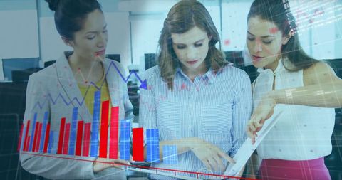 Business team analyzing financial data with collaborative effort